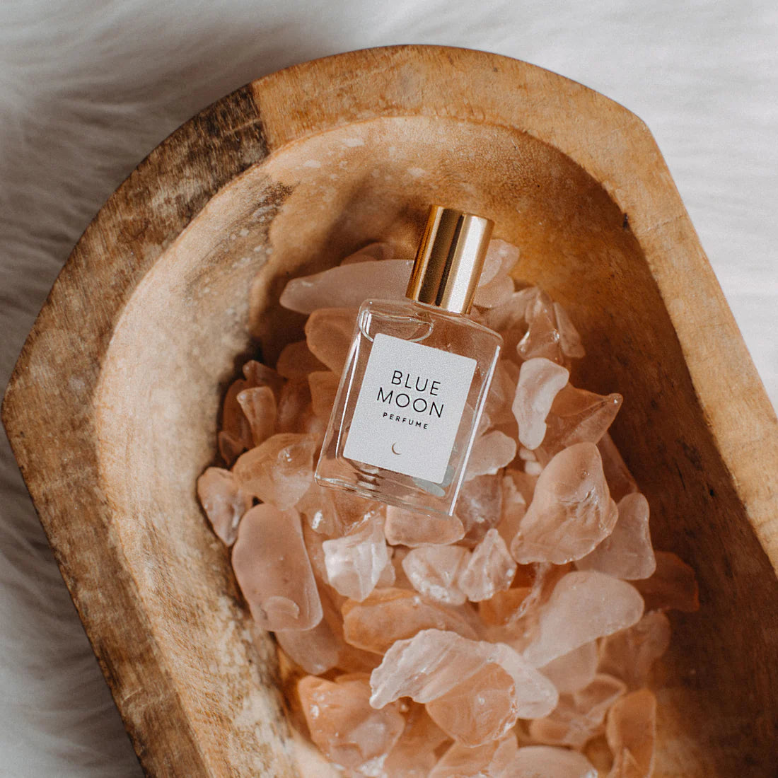 Organic perfume featuring notes of pikake, sea mist, cucumber, musk, and amber blanc.