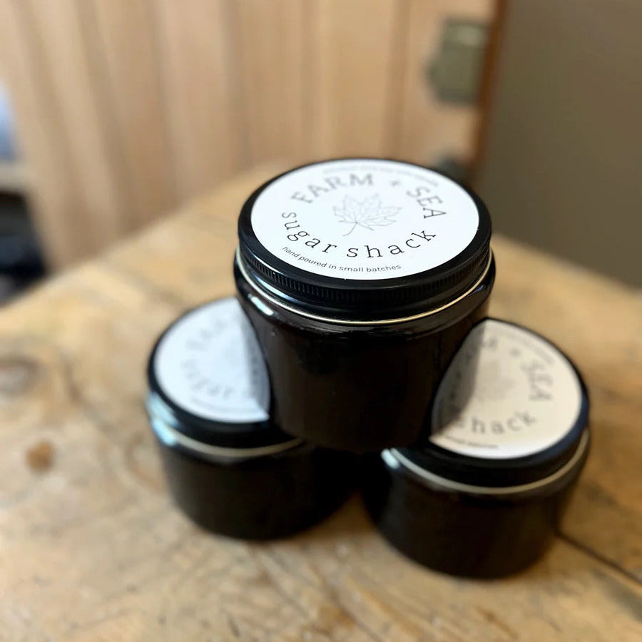 Farm and Sea special edition sugar shack glass candle. All Farm and Sea candles are made with a custom blend of coconut and soy waxes, premium, phthalate-free fragrance oils and essential oils, and cotton wicks.