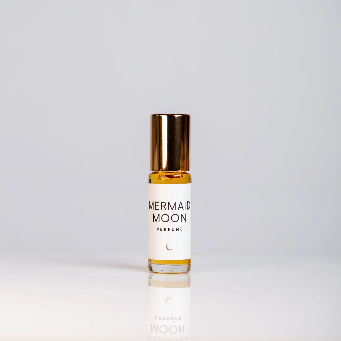 Organic perfume featuring notes of blood orange, black coconut, vanilla, Arabian sandalwood, and African musk.