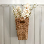 Cream Hydrangea Faux Floral Stems in Water Hyacinth Wall Basket Close Up