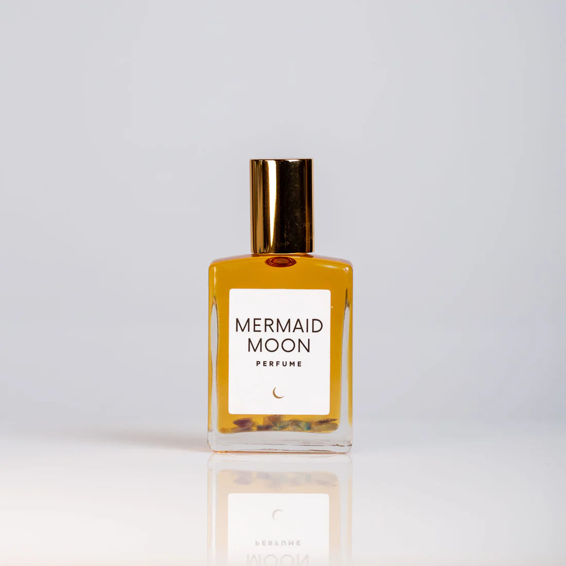 Organic perfume featuring notes of blood orange, black coconut, vanilla, Arabian sandalwood, and African musk.