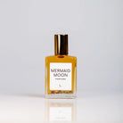 Organic perfume featuring notes of blood orange, black coconut, vanilla, Arabian sandalwood, and African musk.