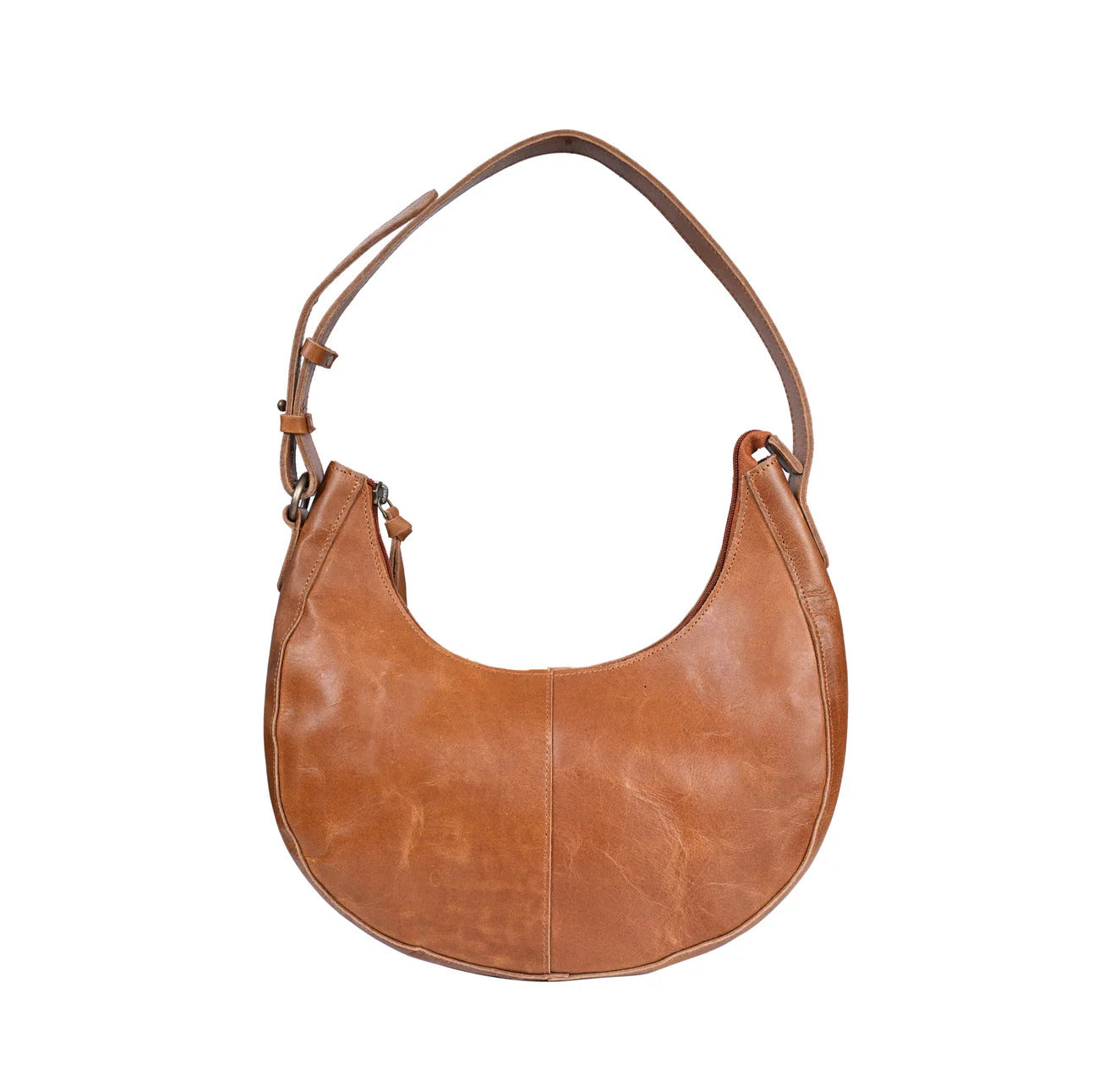 Hobo shaped tan leather bag with antique brass hardware.