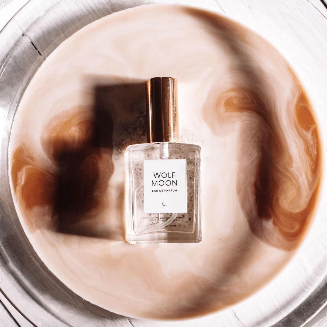 Organic perfume featuring notes of vanilla, amber and soft musk.